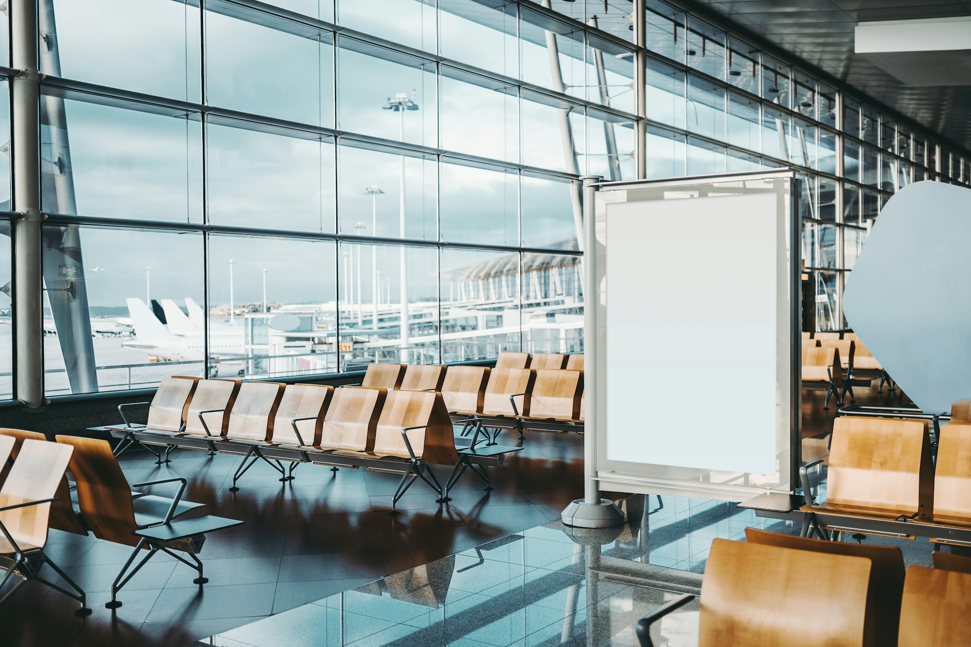 Blank advertising banner in airport setting