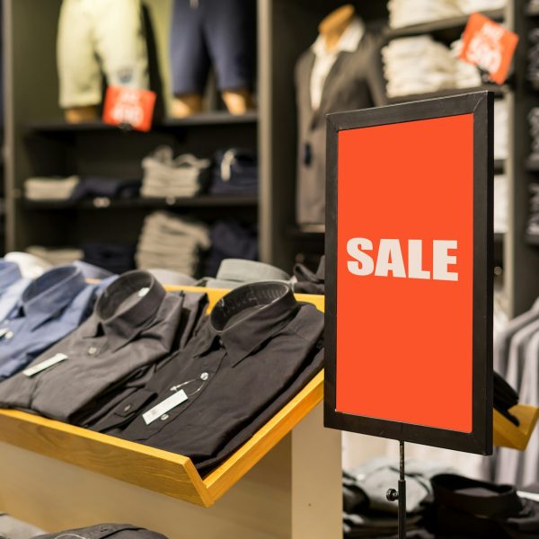 Sale banner and advertise frame in the shopping department store